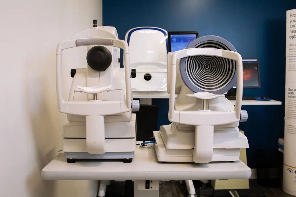 Two diagnostic instruments side by side in the testing area at New Vision Optometry